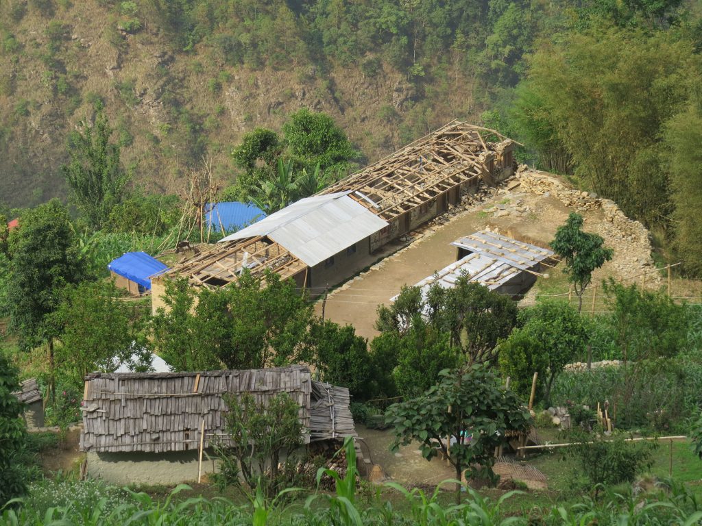 Lop school - the zinc sheet are taken out to build a temporary 